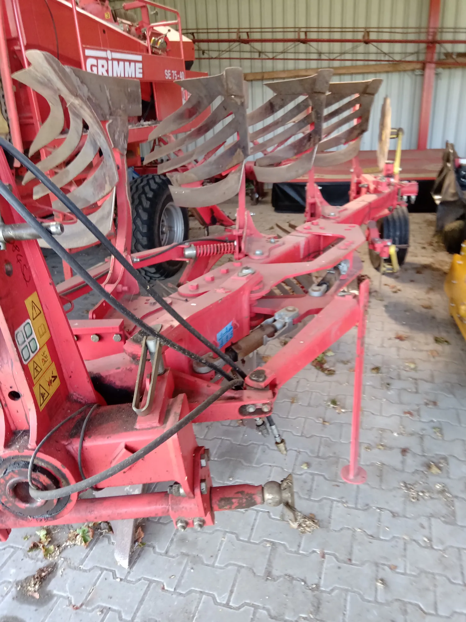Poettinger Servo 45 wentelploeg + pakker te koop