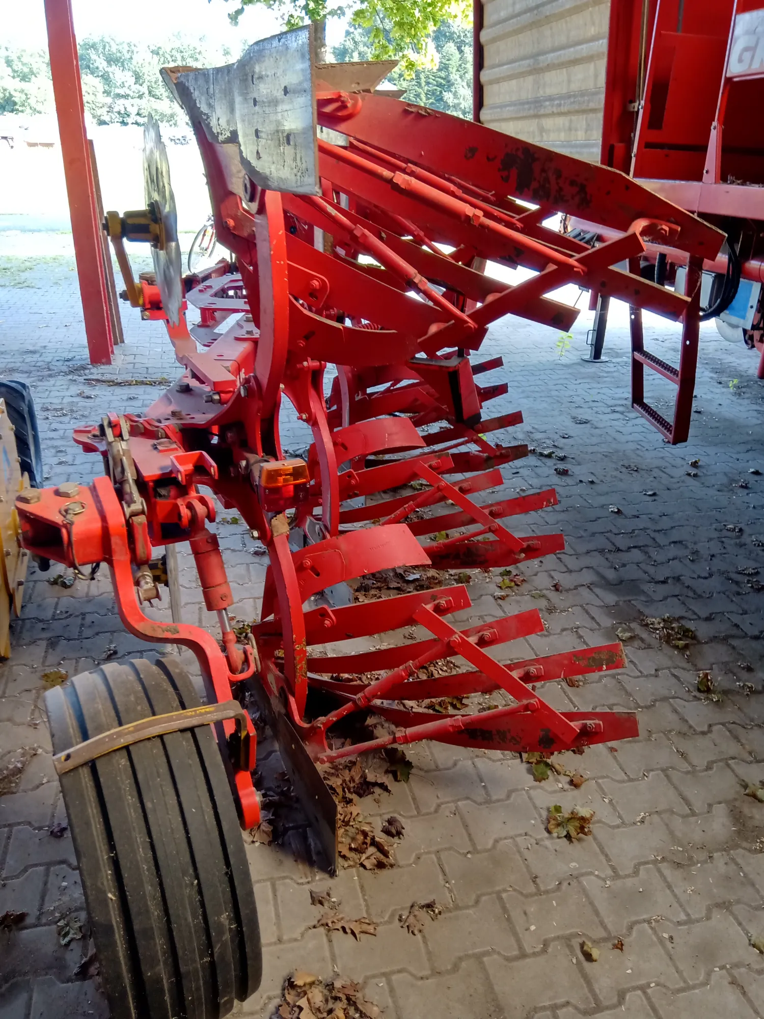 Poettinger Servo 45 wentelploeg + pakker te koop