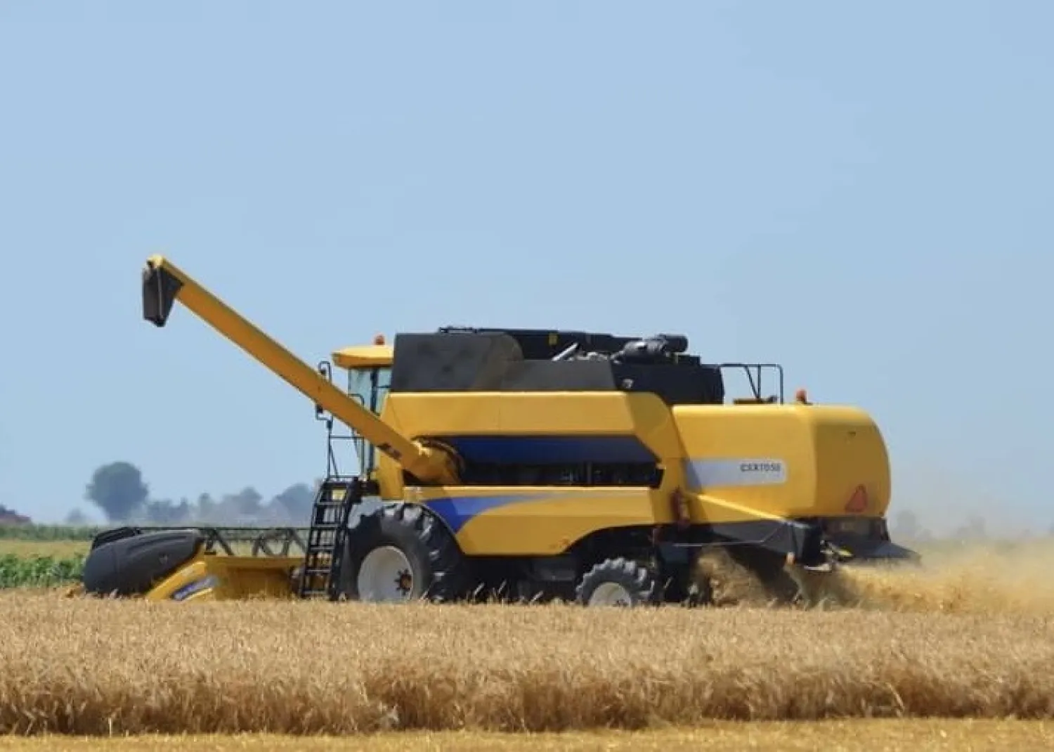 Cosechadora New Holland CSX 7050 - 4WD, Cabezal 6m