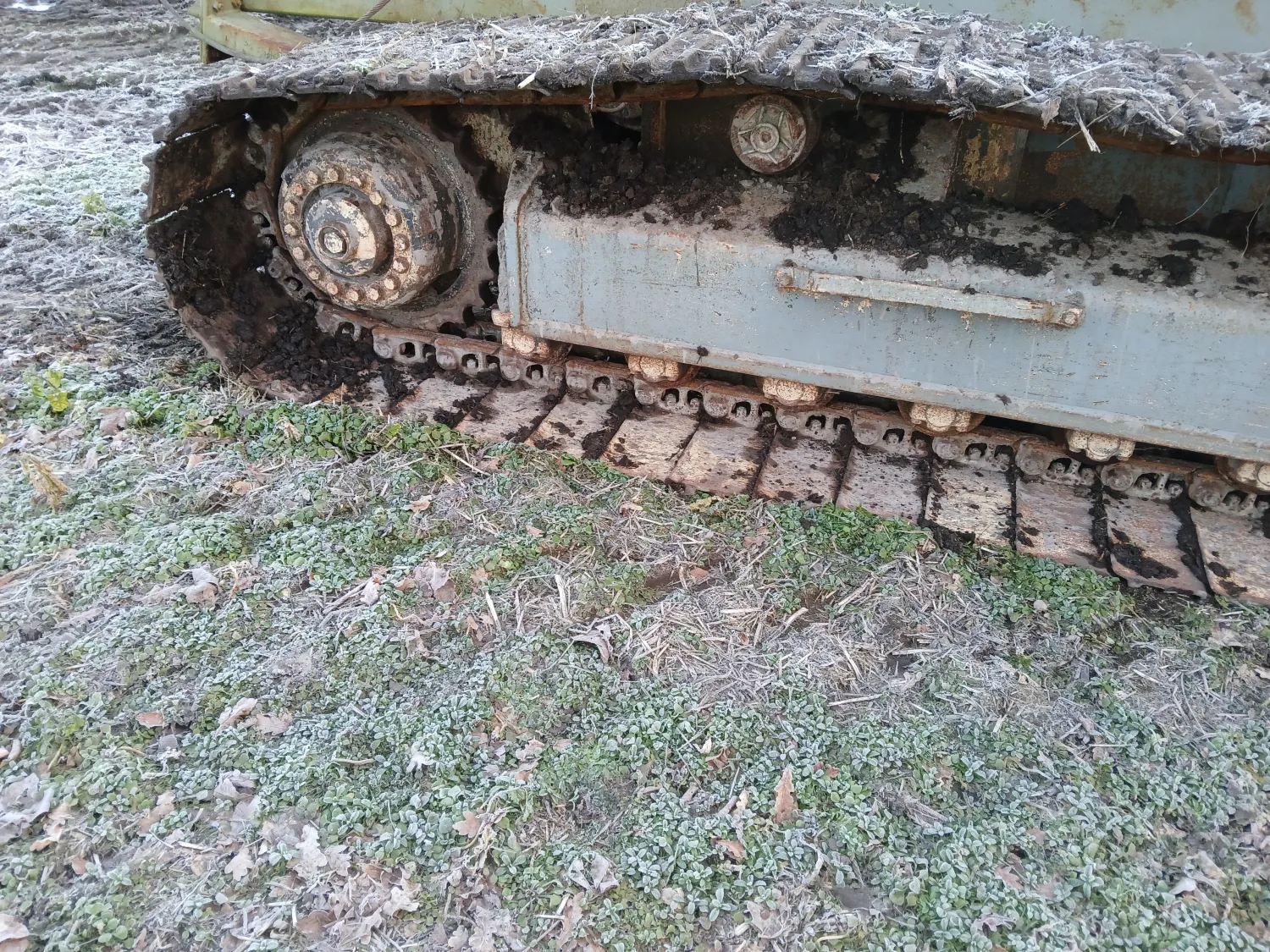 Rupsvoertuig met containersysteem voor natte percelen