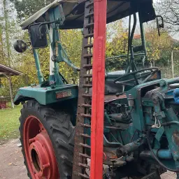 Hanomag 401 с товарач и косачка за продажба