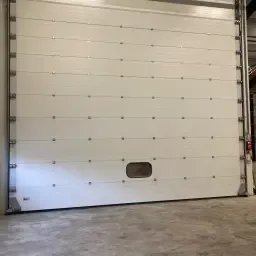 Overheaddeur - 6,93m breed, 5,7m hoog - Nieuwstaat