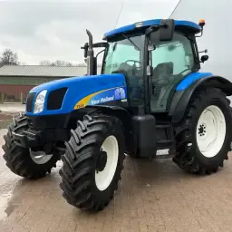 New-Holland TS115A: Moteur & Pneus Neufs - Excellent état!